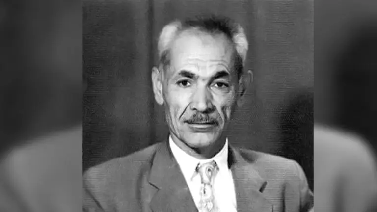 distinguished elderly gentleman in a suit and tie.